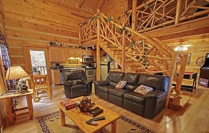 1649 Bear Valley Road Sevierville, TN 37876 - Photo 3 of 8 a living room with furniture and a wooden floor