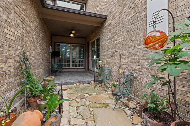 a front view of a house with a large window