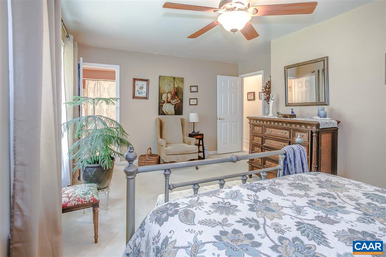 16 Bernardsburg Road Palmyra, VA 22963 - Photo 11 of 24 a bed room with a bed and a chair