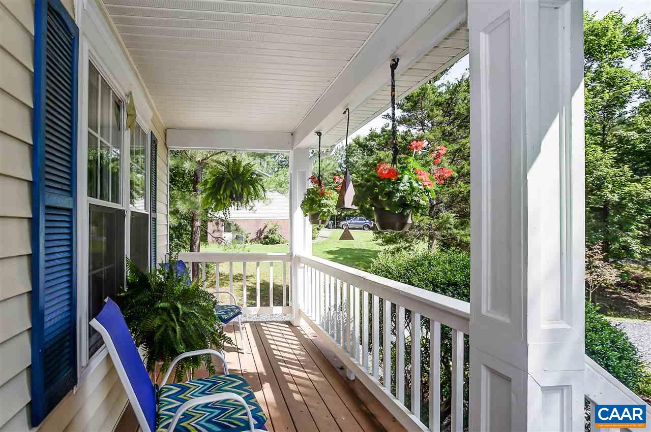 16 Bernardsburg Road Palmyra, VA 22963 - Photo 3 of 24 a view of a balcony with flower plants