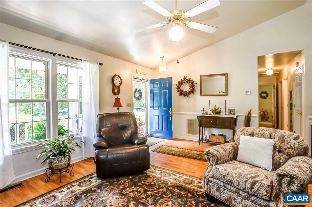 16 Bernardsburg Road Palmyra, VA 22963 - Photo 6 of 24 a living room with furniture and a fireplace