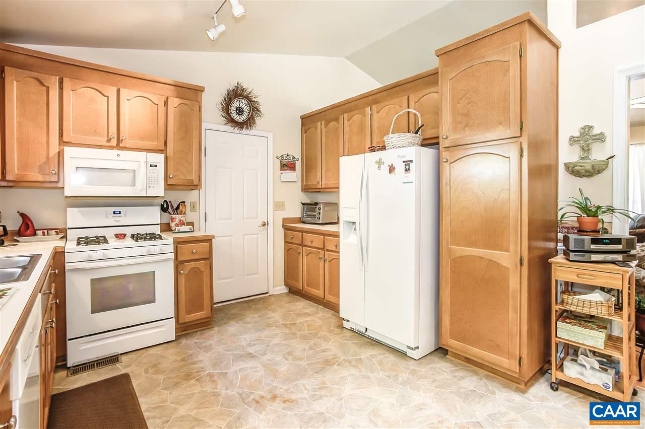 16 Bernardsburg Road Palmyra, VA 22963 - Photo 8 of 24 a kitchen with stainless steel appliances a refrigerator sink and cabinets
