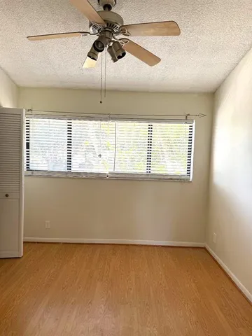 a bathroom with a tub a sink and shower