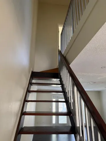 a bathroom with a sink vanity and mirror