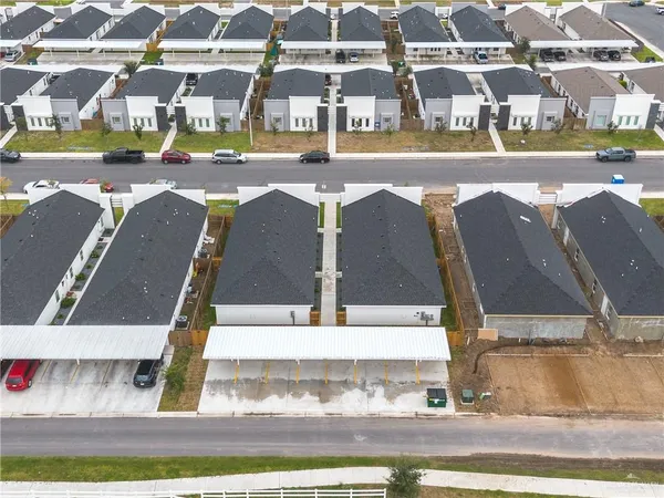 a view of swimming pool with outdoor seating and yard