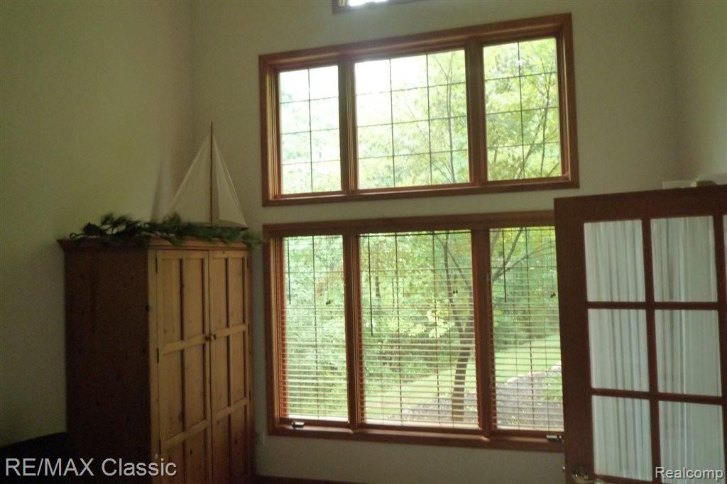 9418 Quail Ridge Run Brighton, MI 48114 - Photo 14 of 20 Looking Out From Study