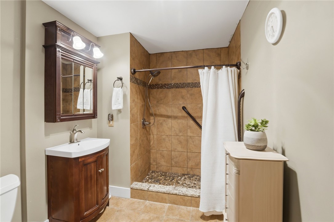 180 Allen Street, Unit 101 Woonsocket, RI 02895 - Photo 16 of 40 tile walk in shower