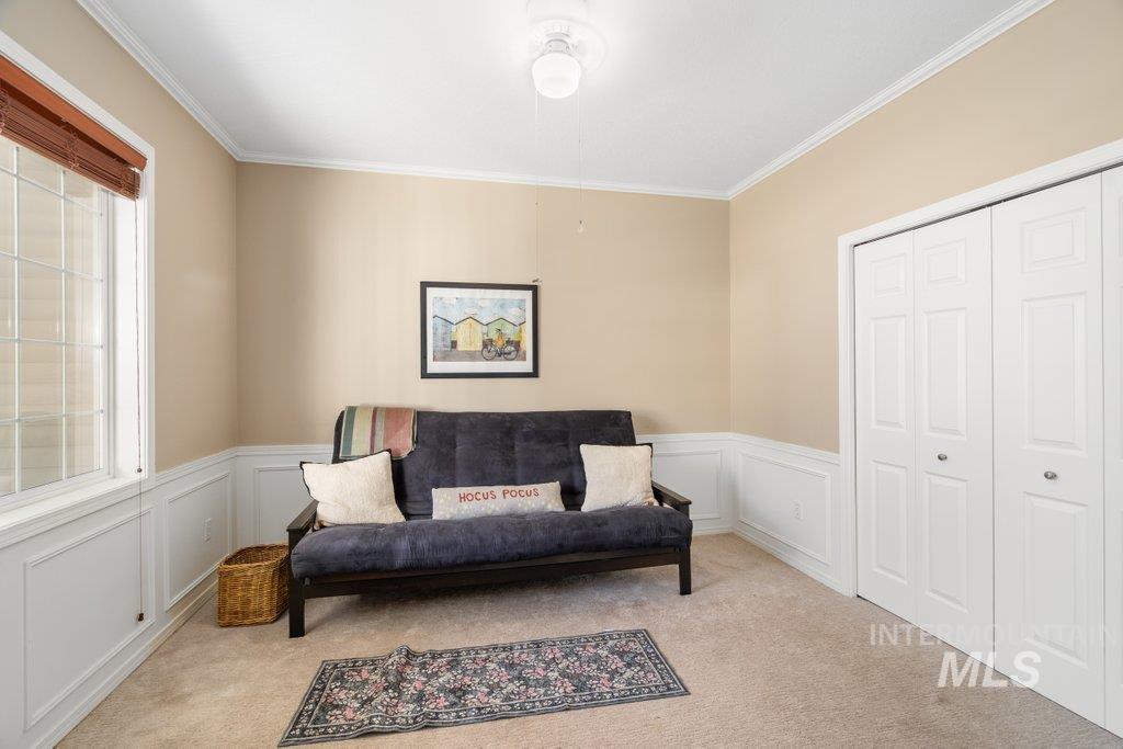 865 Fairview Drive Moscow, ID 83843 - Photo 9 of 50 Living area with ornamental molding and carpet