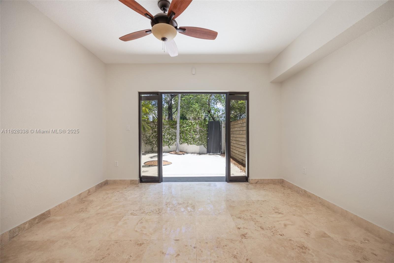 3204 Bird Avenue, Unit 108 Coconut Grove, FL 33133 - Photo 5 of 19 an empty room with windows