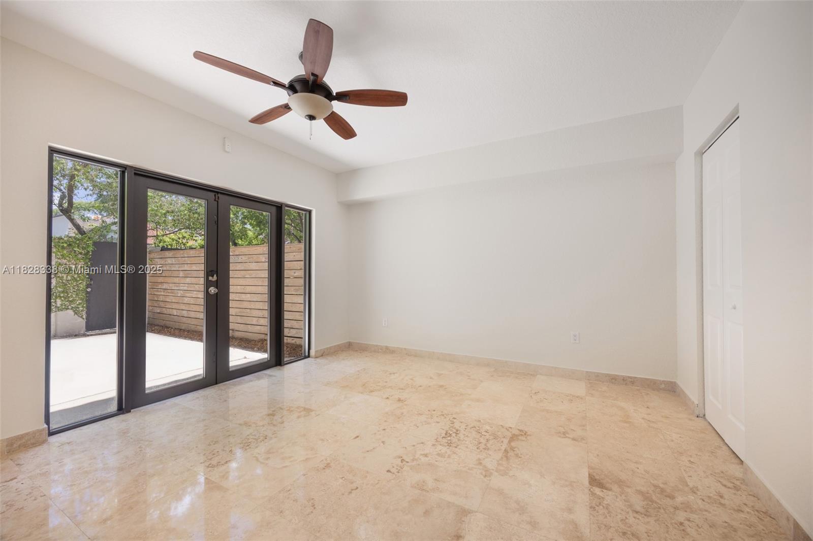 3204 Bird Avenue, Unit 108 Coconut Grove, FL 33133 - Photo 6 of 19 a view of an empty room and window