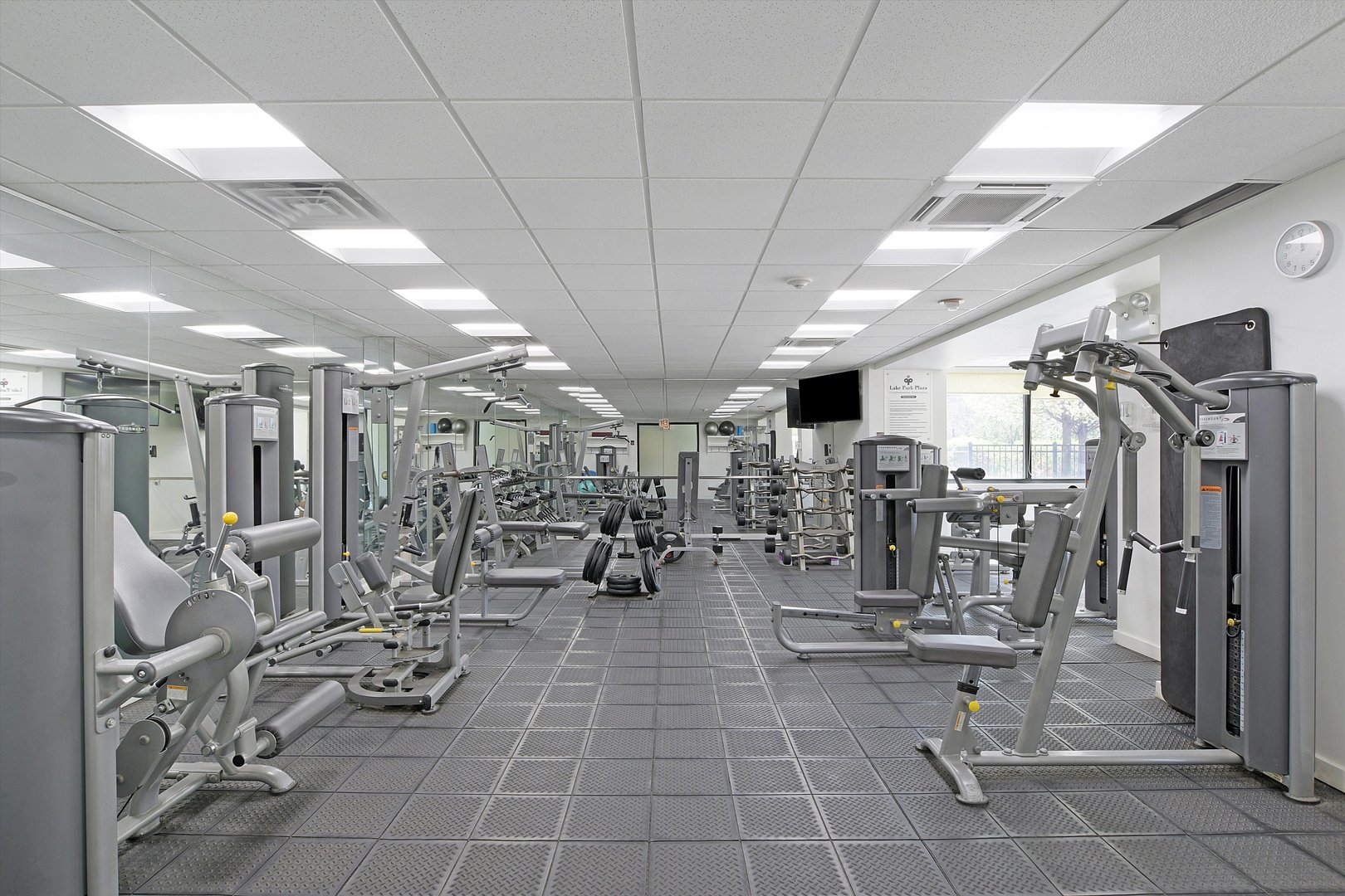 3930 North Pine Grove Avenue, Unit 2308 Chicago, IL 60613 - Photo 23 of 29 a view of a room with gym equipment