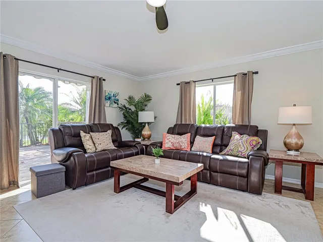 a spacious bedroom with a bed and a couch