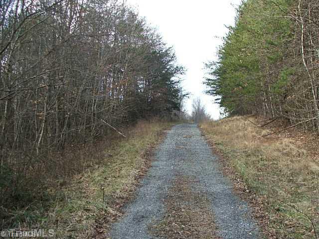 100 Simpson Mill Road, Unit 100 Dobson, NC 27017 - Photo 1 of 8 Aerial View. ROAD ON LEFT SIDE