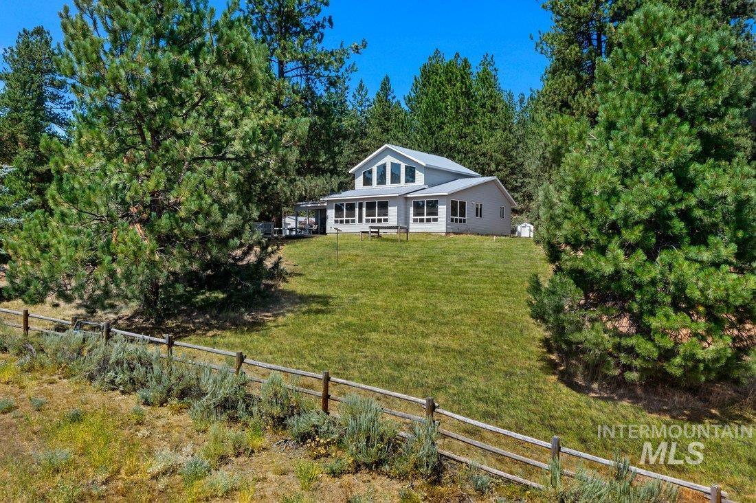 111 Ranch Circle Cascade, ID 83611 - Photo 42 of 43 View of front of house with view of wooded area
