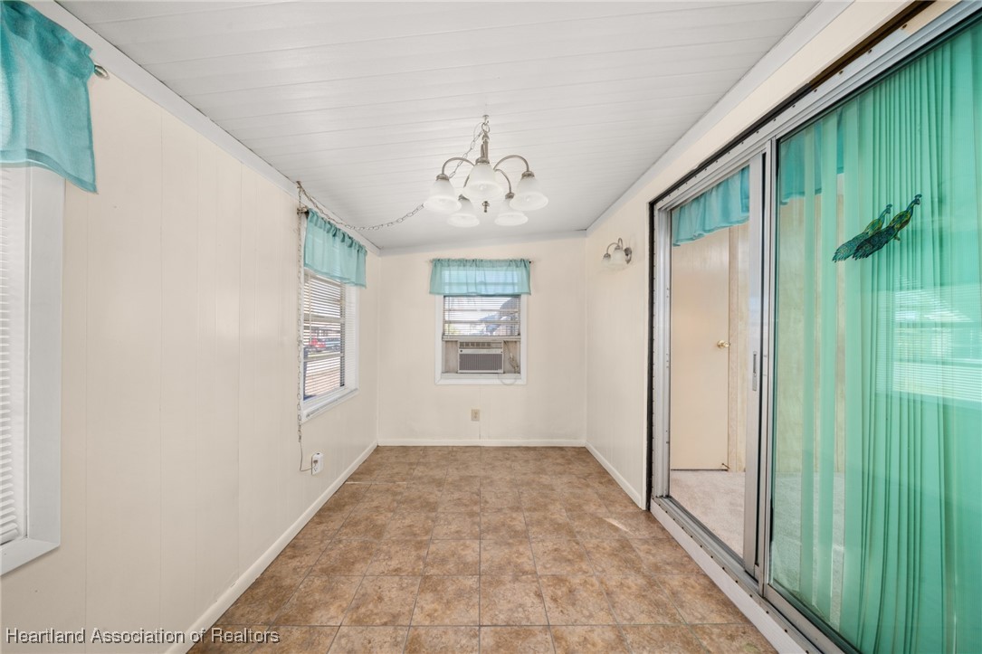 1523 Caribbean Road Sebring, FL 33870 - Photo 5 of 46 LANAI ENTRANCE