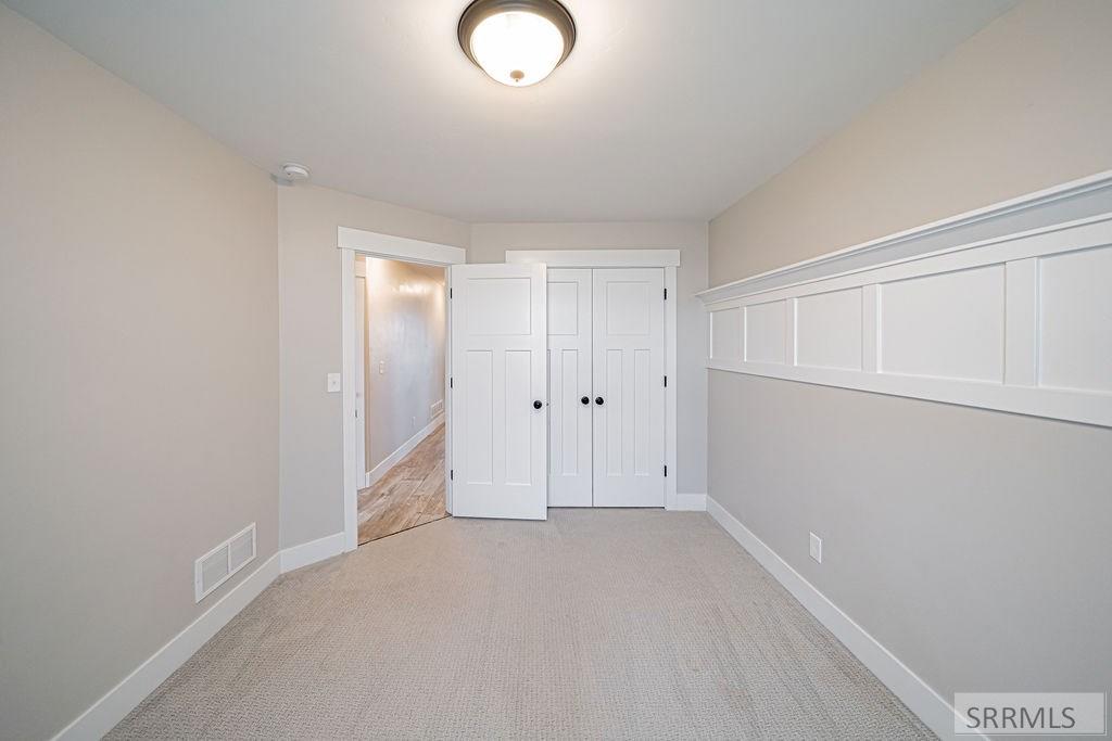 70 North 4161 Street Rigby, ID 83442 - Photo 41 of 60 Main Level Bedroom 3