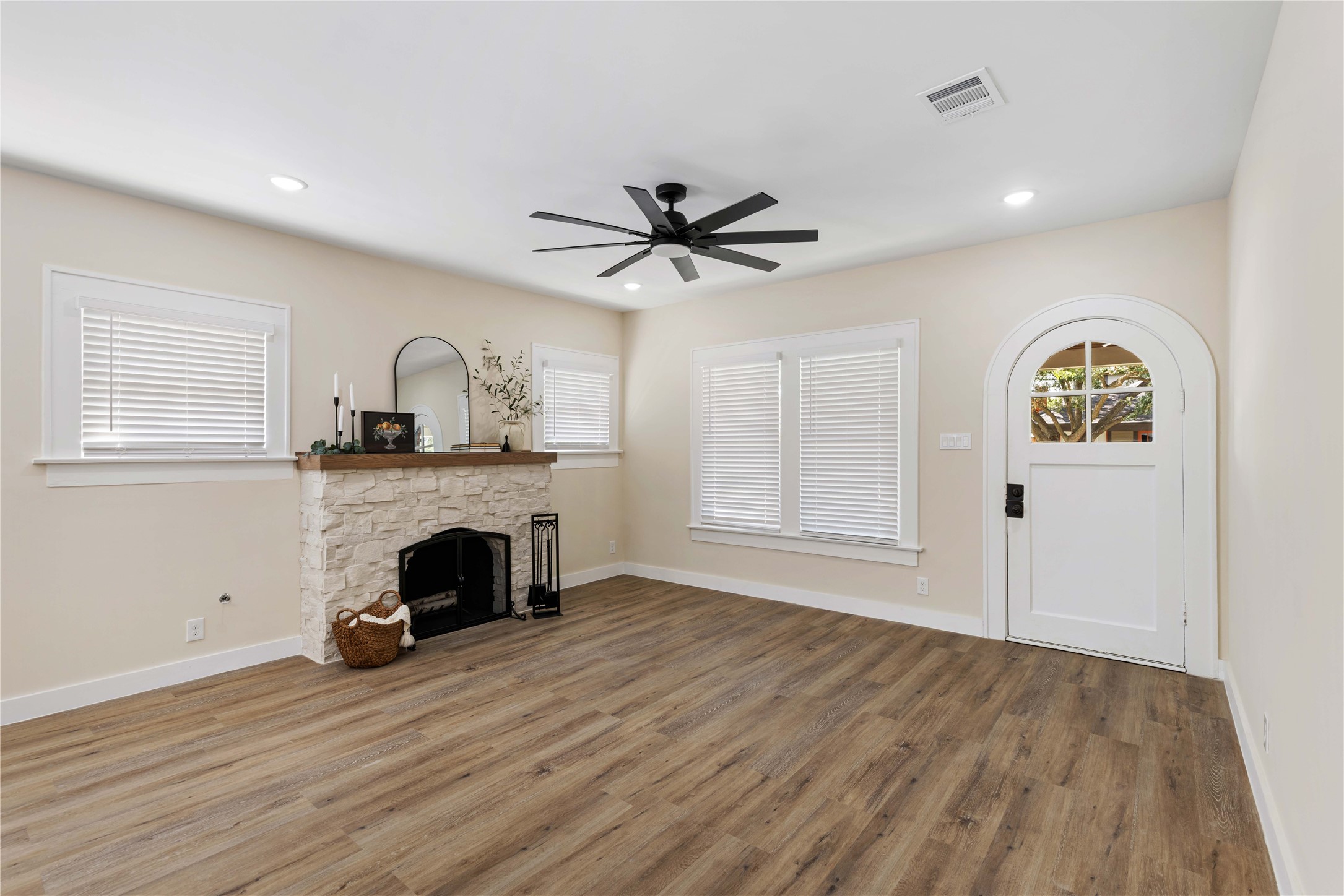 908 Key Street Houston, TX 77009 - Photo 11 of 29 Stone face lift on original fireplace with new stained mantel