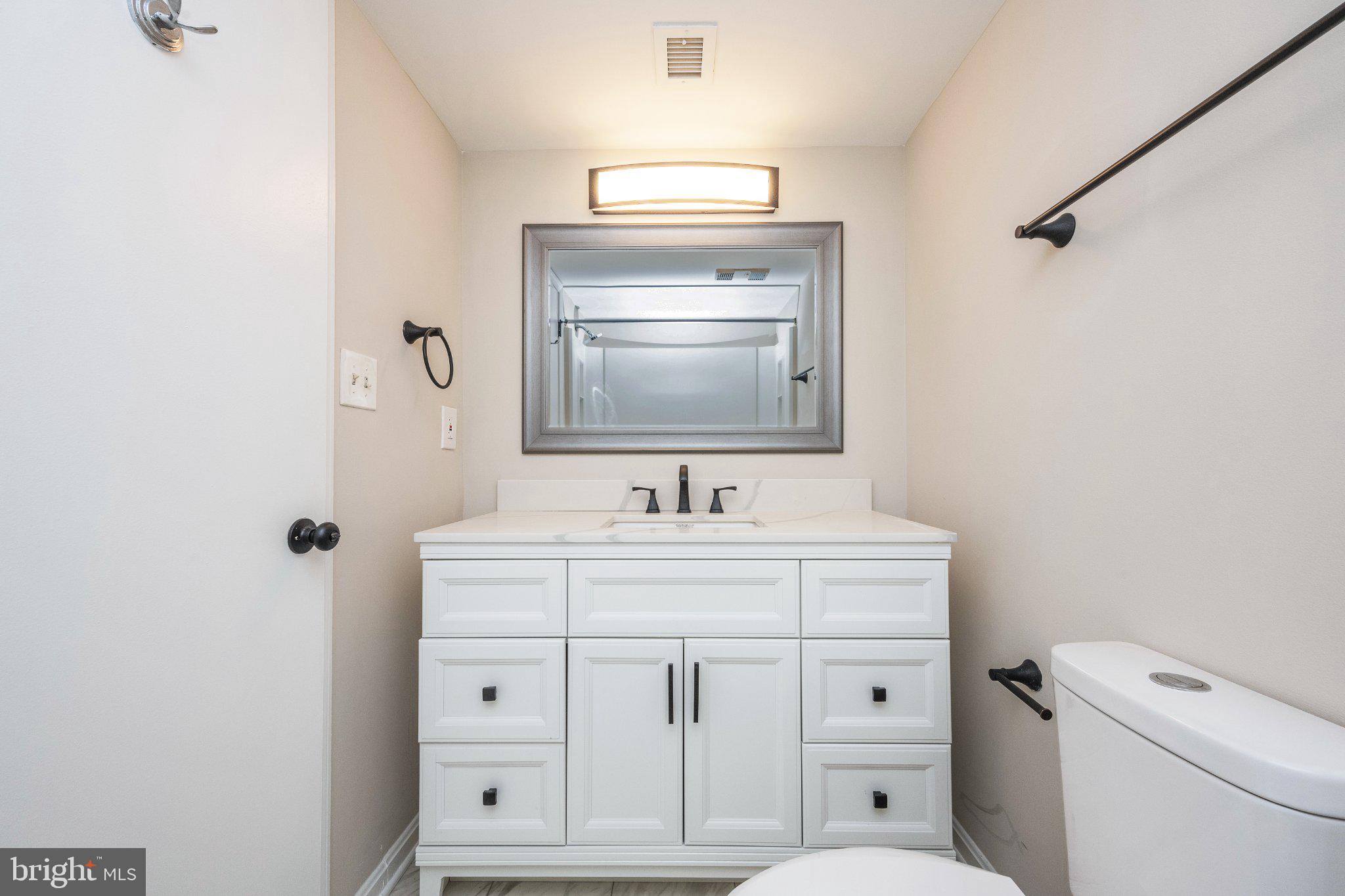 5908 Cove Landing Road, Unit 204 Burke, VA 22015 - Photo 19 of 32 Primary bath updated 2024