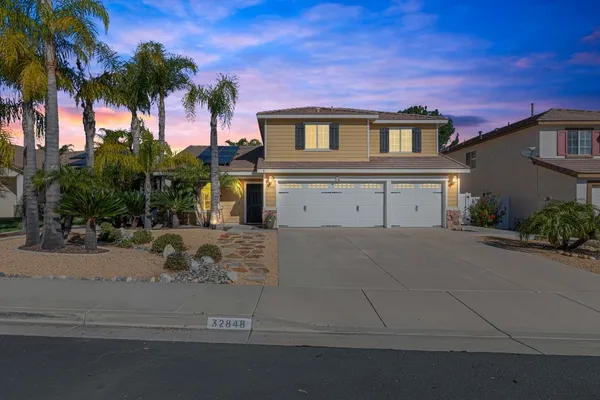a house view with a garden space
