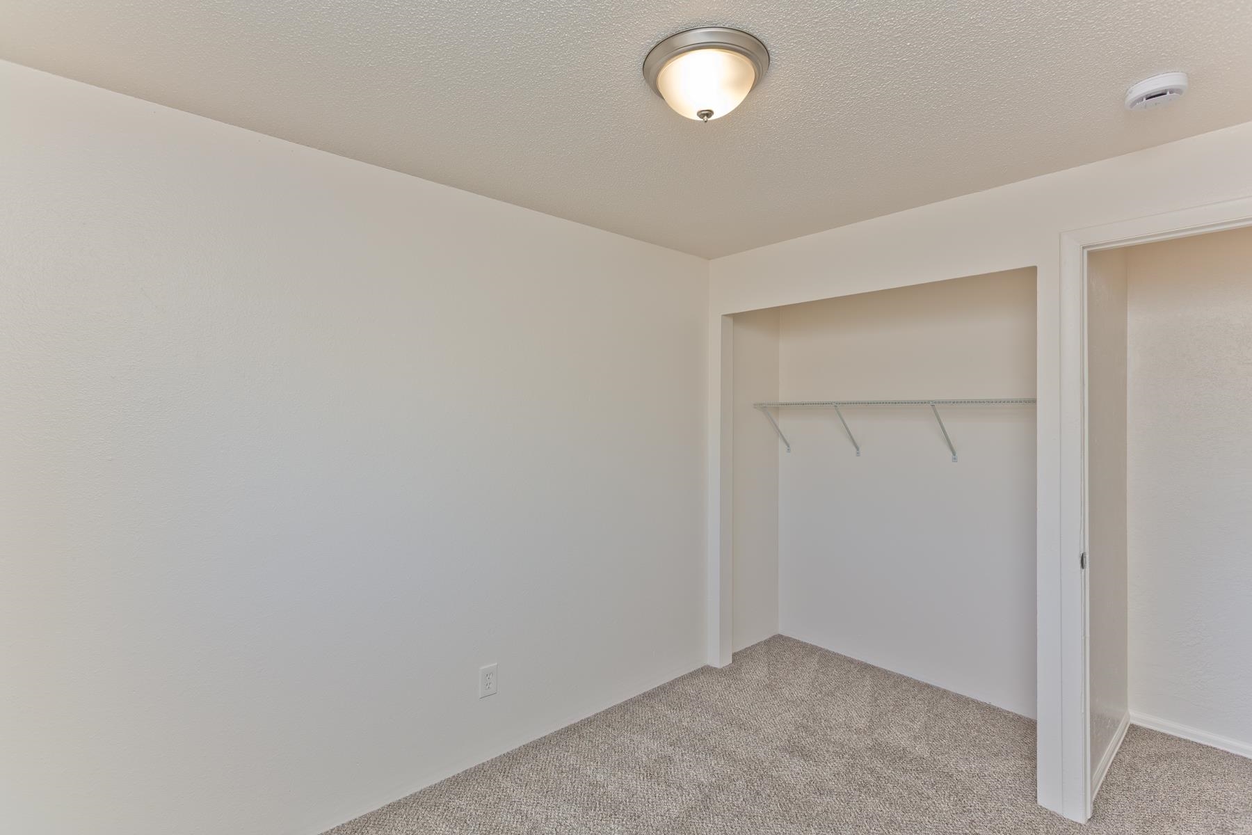 3212 D D 1/4 Road Clifton, CO 81520 - Photo 12 of 25 an empty room with closet area