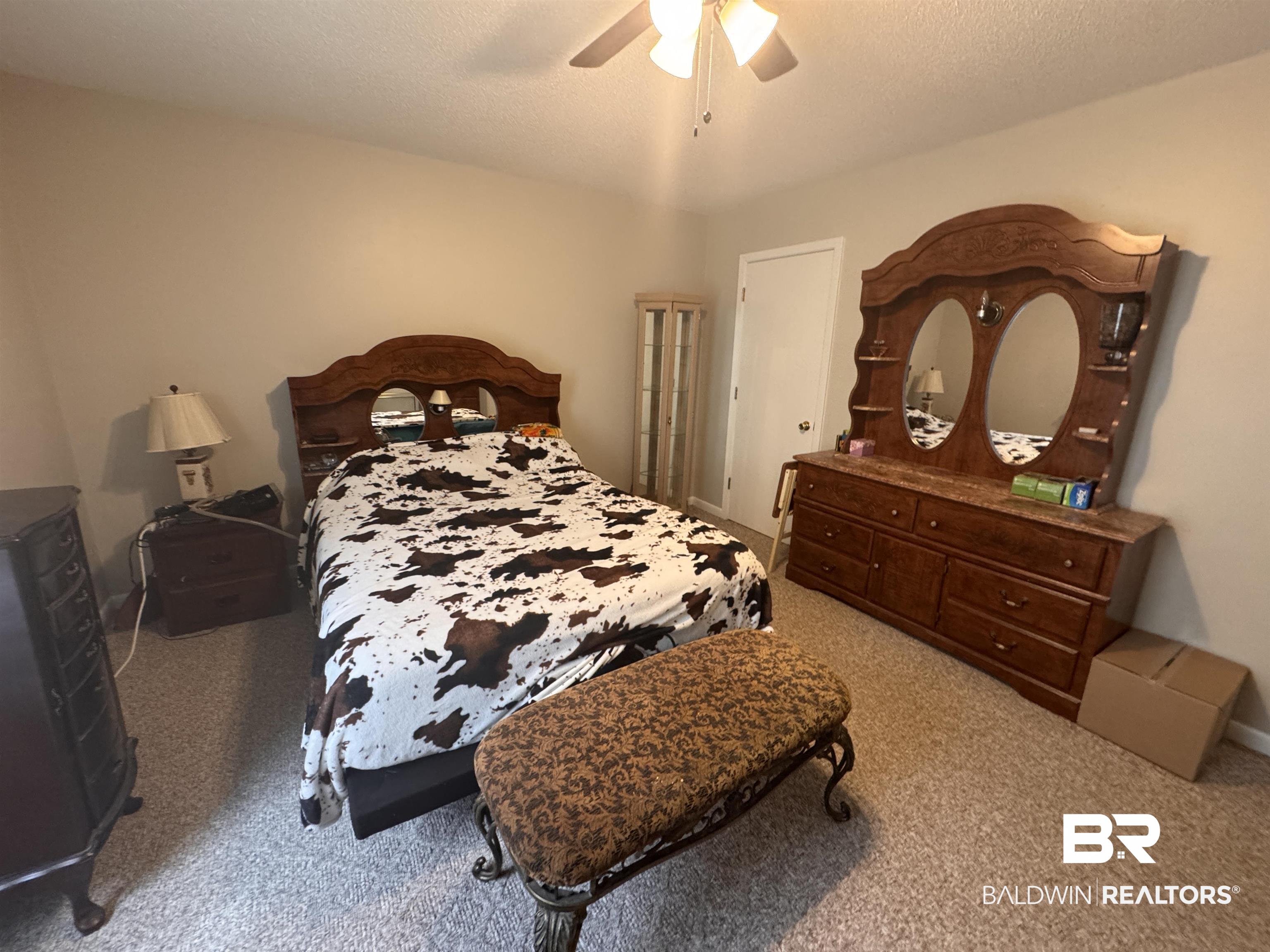 15148 Highland Circle Foley, AL 36535 - Photo 24 of 47 Carpeted bedroom with a ceiling fan