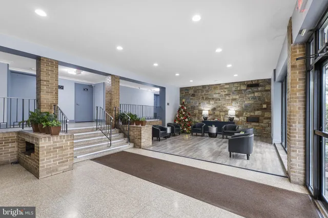 a view of a living room and entry way
