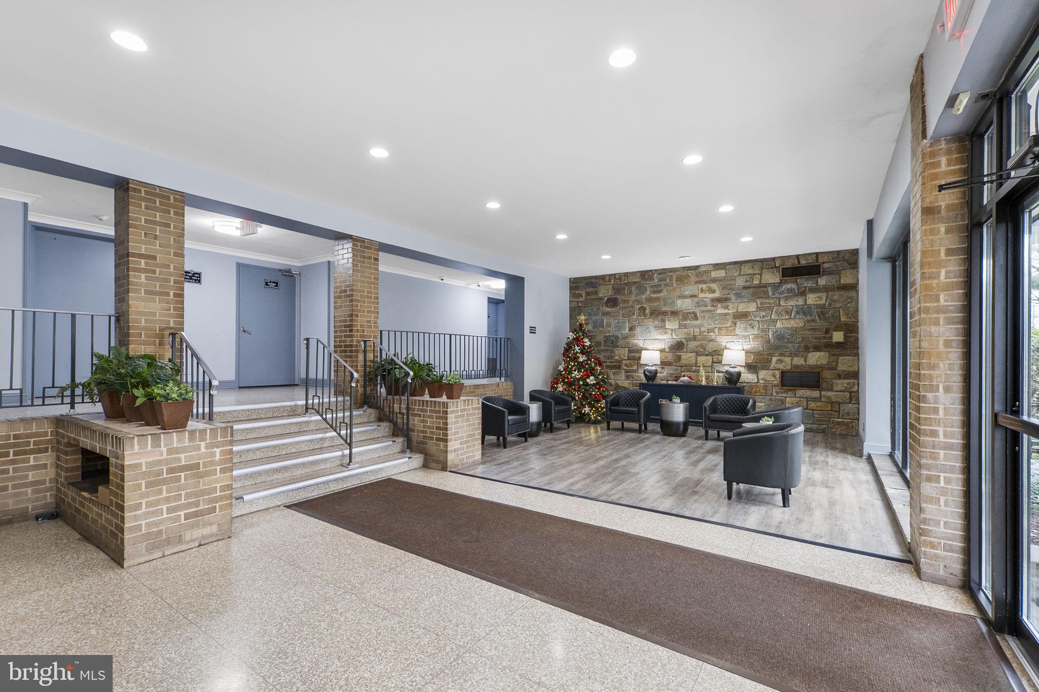 8601 Manchester Road, Unit 220 Silver Spring, MD 20901 - Photo 24 of 27 a view of a living room and entry way