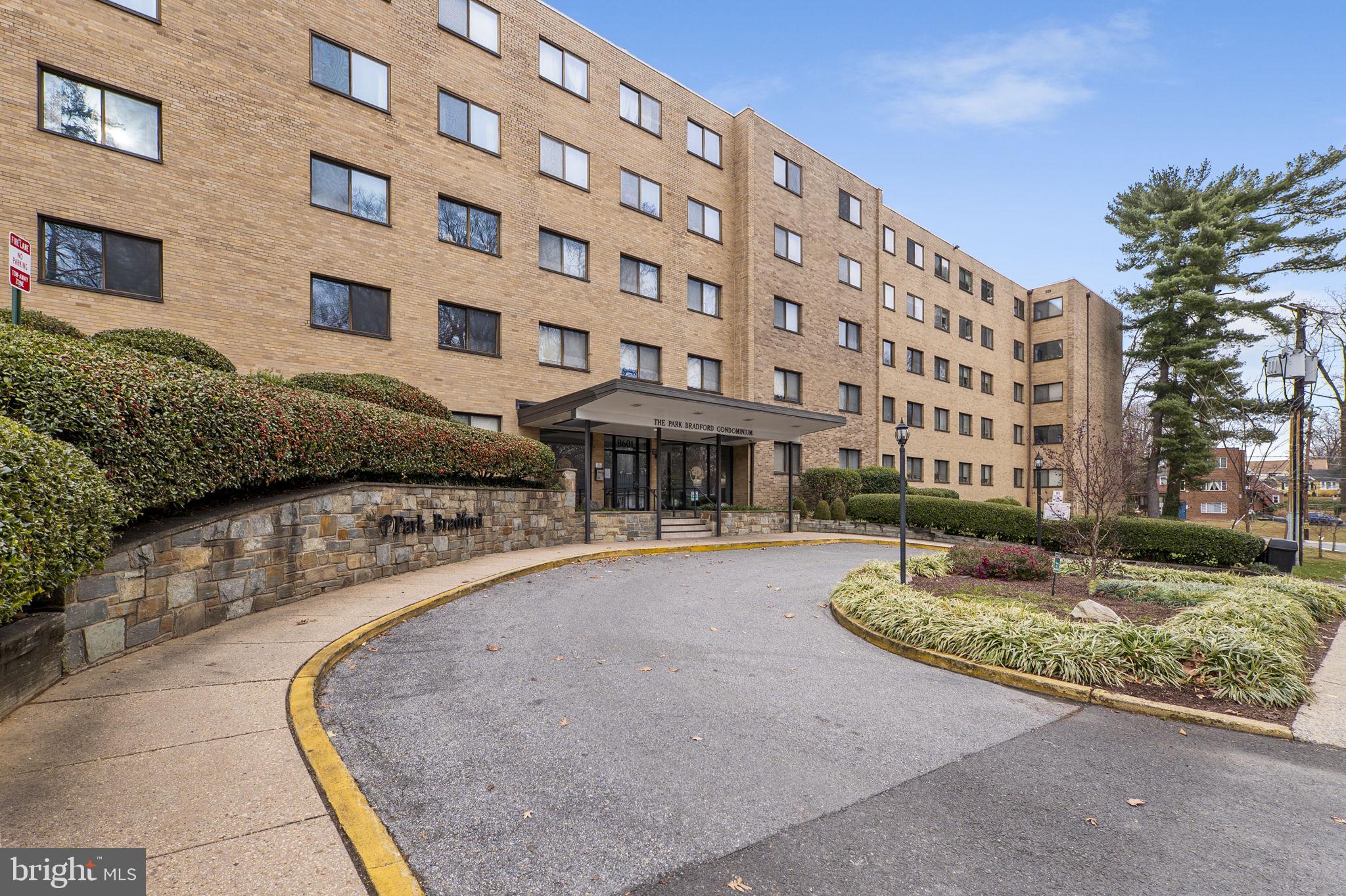 8601 Manchester Road, Unit 220 Silver Spring, MD 20901 - Photo 26 of 27 a front view of a building with outdoor seating
