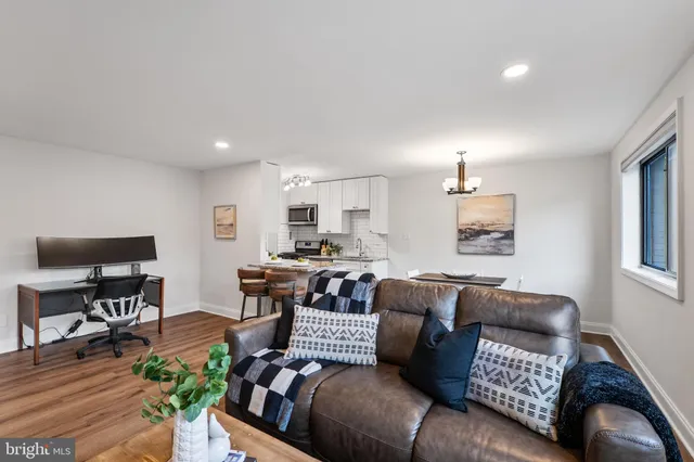a living room with furniture and a couch