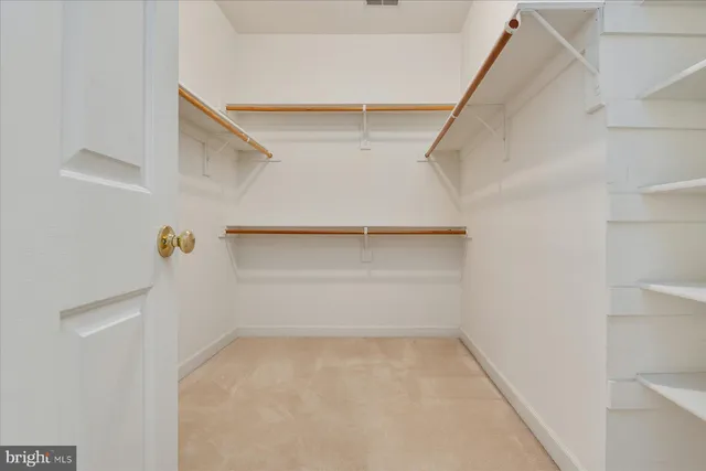 a bathroom with a double vanity sink and mirror
