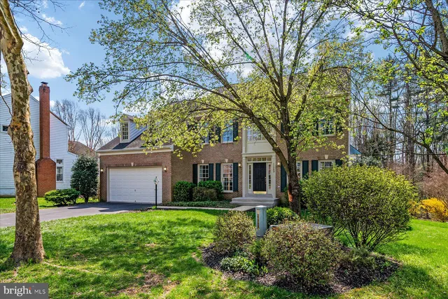 a big room with closet and a mirror