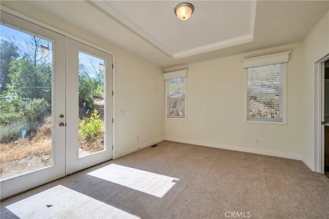 a view of an empty room and window