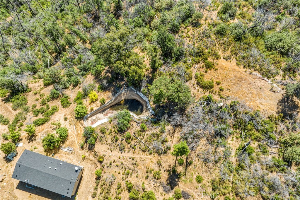 12299 Elk Mountain Road Upper Lake, CA 95485 - Photo 22 of 37 an aerial view of residential house with swimming pool and trees