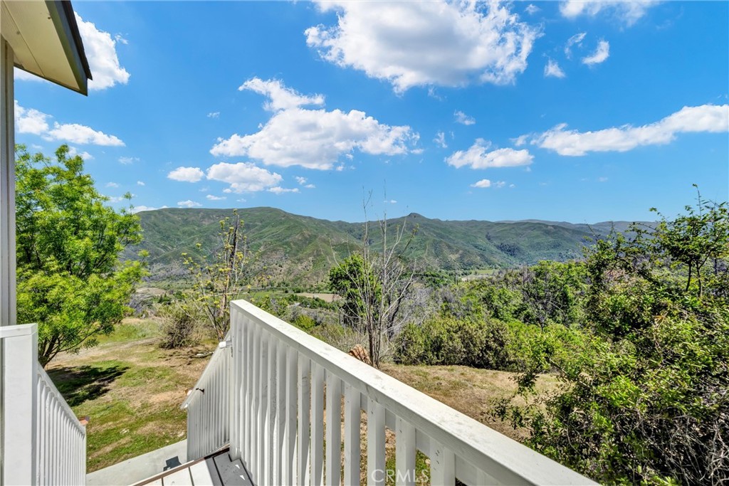 12299 Elk Mountain Road Upper Lake, CA 95485 - Photo 32 of 37 a balcony with an outdoor space