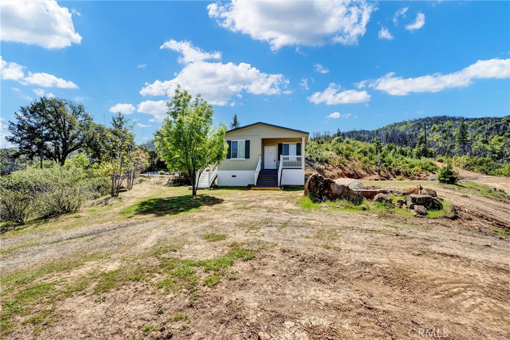 12299 Elk Mountain Road Upper Lake, CA 95485 - Photo 37 of 37 a view of a house with a yard