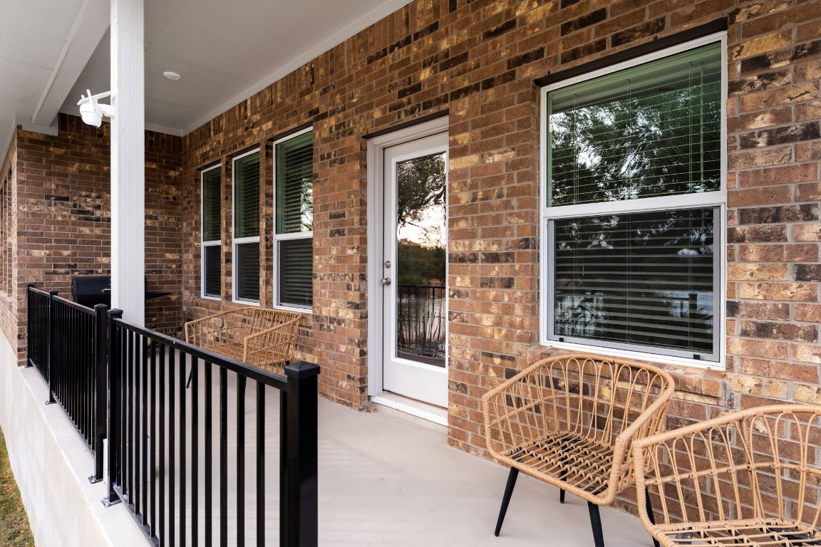 4264 Hill House Lane Georgetown, TX 78628 - Photo 27 of 30 Entrance to property with brick siding and a porch