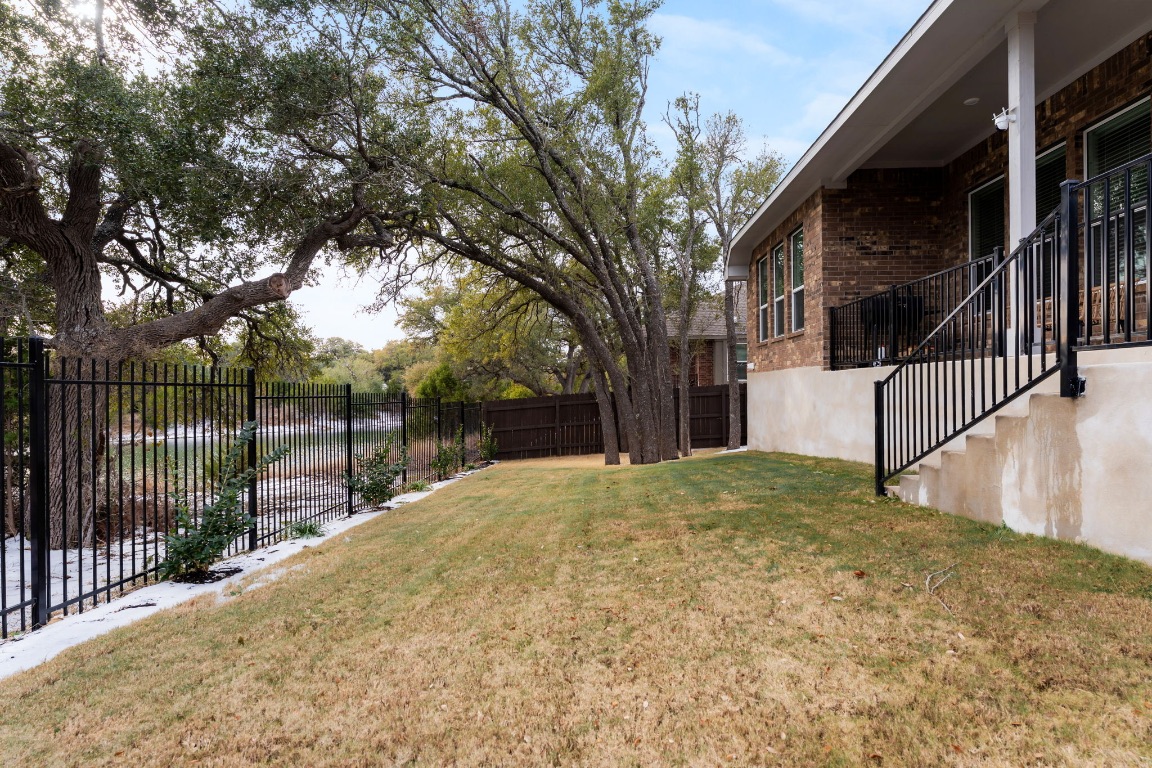 4264 Hill House Lane Georgetown, TX 78628 - Photo 28 of 30 Fenced backyard with stairs
