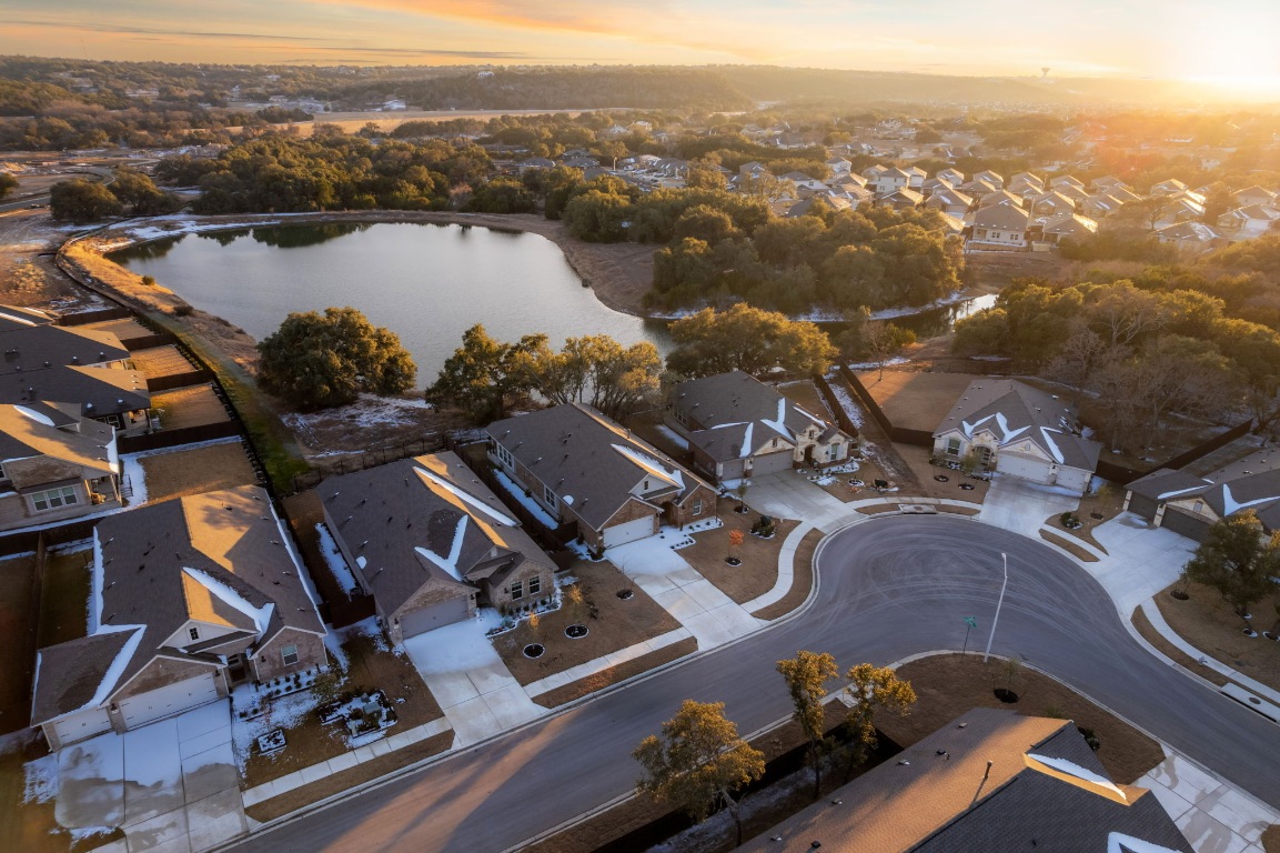 4264 Hill House Lane Georgetown, TX 78628 - Photo 30 of 30 Aerial view at dusk of a water view and a residential view