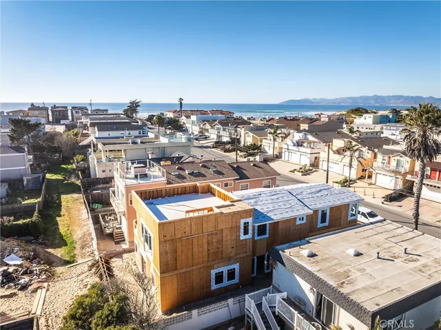an aerial view of a building with an outdoor space