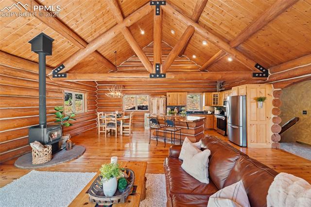 Open concept living, dining and kitchen with island