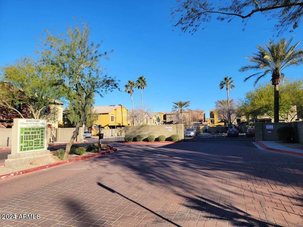 2150 West Alameda Road, Unit 1169 Phoenix, AZ 85085 - Photo 7 of 26 a view of a street with a building in the background
