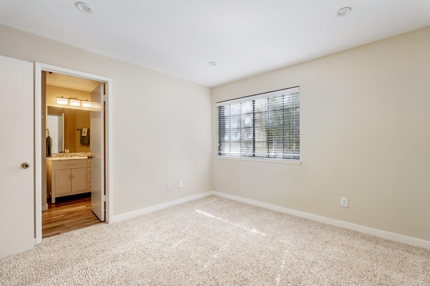 710 Pheasant Ridge Road Del Rey Oaks, CA 93940 - Photo 20 of 35 an empty room with windows and bathroom