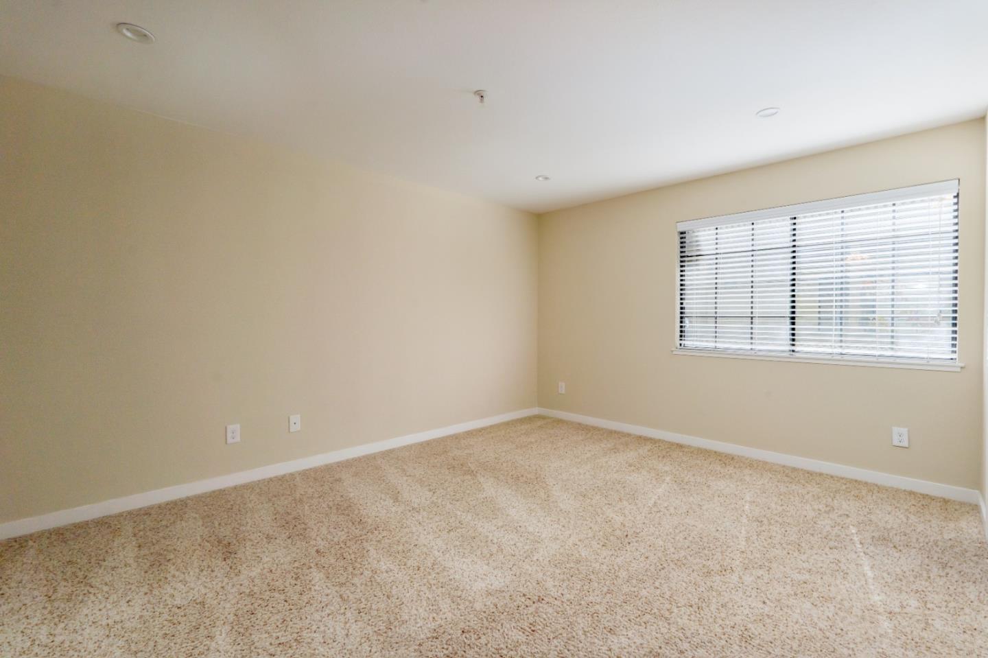 710 Pheasant Ridge Road Del Rey Oaks, CA 93940 - Photo 22 of 35 an empty room with a window