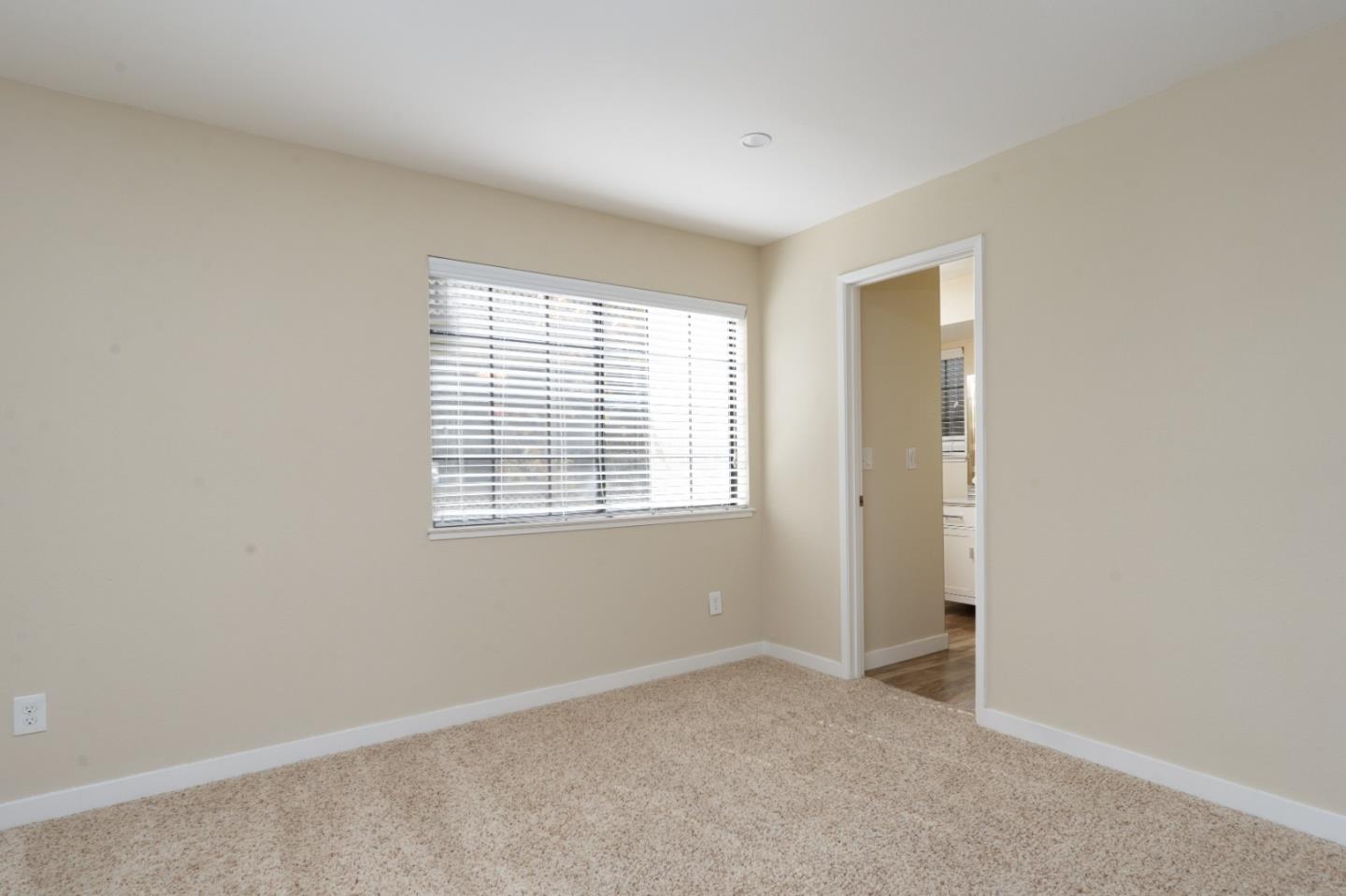 710 Pheasant Ridge Road Del Rey Oaks, CA 93940 - Photo 23 of 35 a view of an empty room with a window