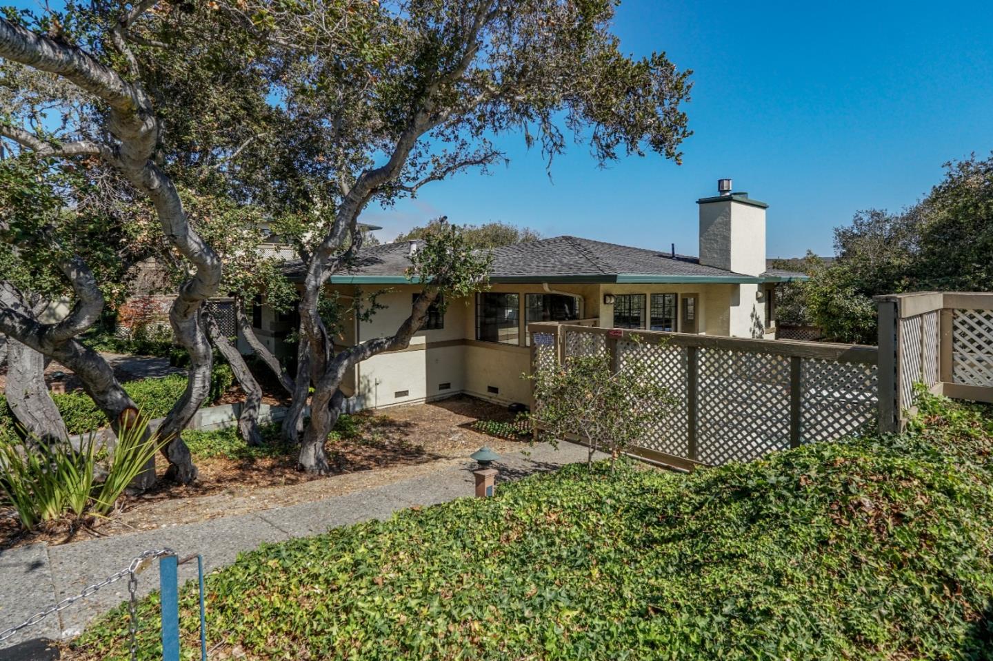 710 Pheasant Ridge Road Del Rey Oaks, CA 93940 - Photo 28 of 35 a front view of a house with a garden