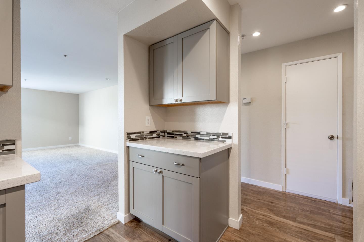710 Pheasant Ridge Road Del Rey Oaks, CA 93940 - Photo 8 of 35 a kitchen with a stove and a refrigerator