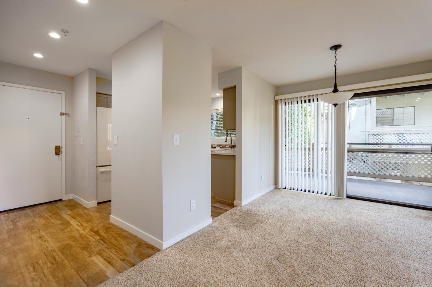 710 Pheasant Ridge Road Del Rey Oaks, CA 93940 - Photo 9 of 35 a view of livingroom with hardwood floor and a ceiling fan