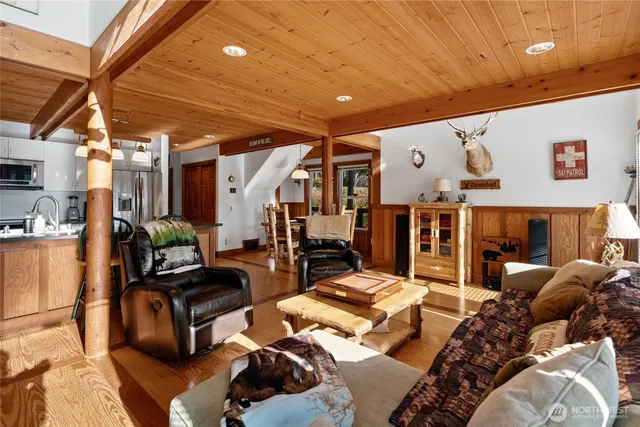 a kitchen with stainless steel appliances granite countertop a stove and a refrigerator