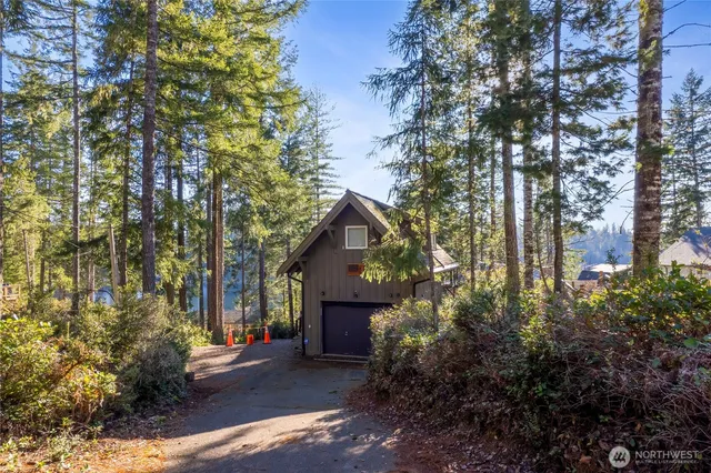 a front view of a house with a garage