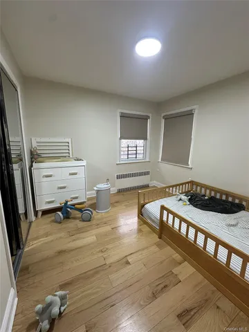 a room with gym equipment and a large window